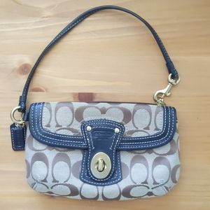 Coach brown canvas clutch